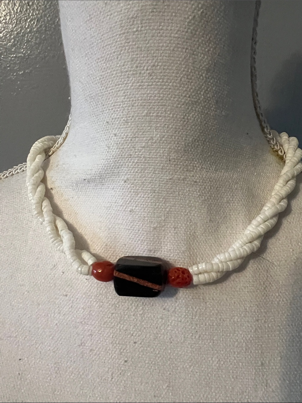 Handcrafted White Beaded Necklace with Black and Coral Accent